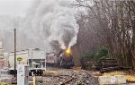 CNJ 113 approaching the Maple Avenue grade crossing with the Santa train